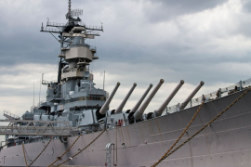 navy ship with some big guns